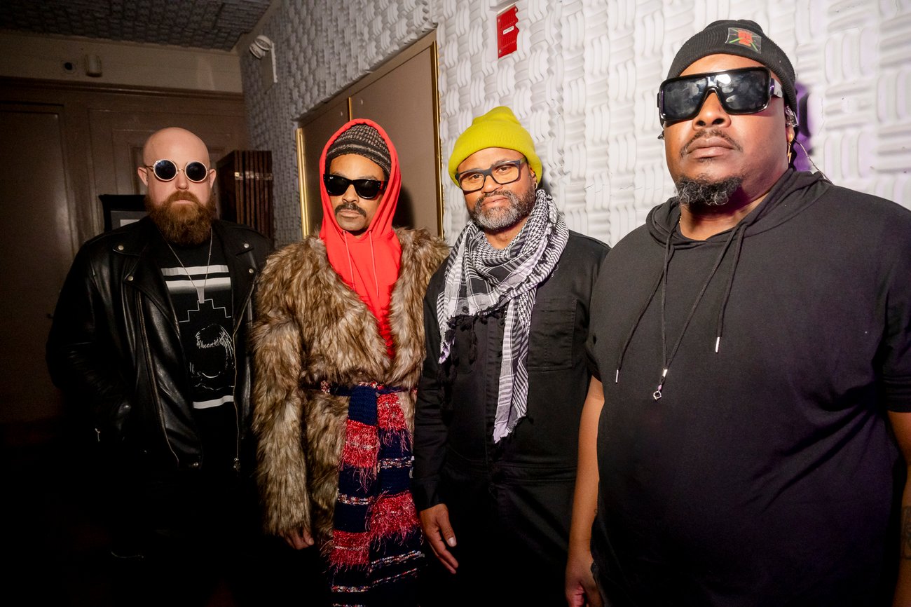 Singer Bilal backstage with his band