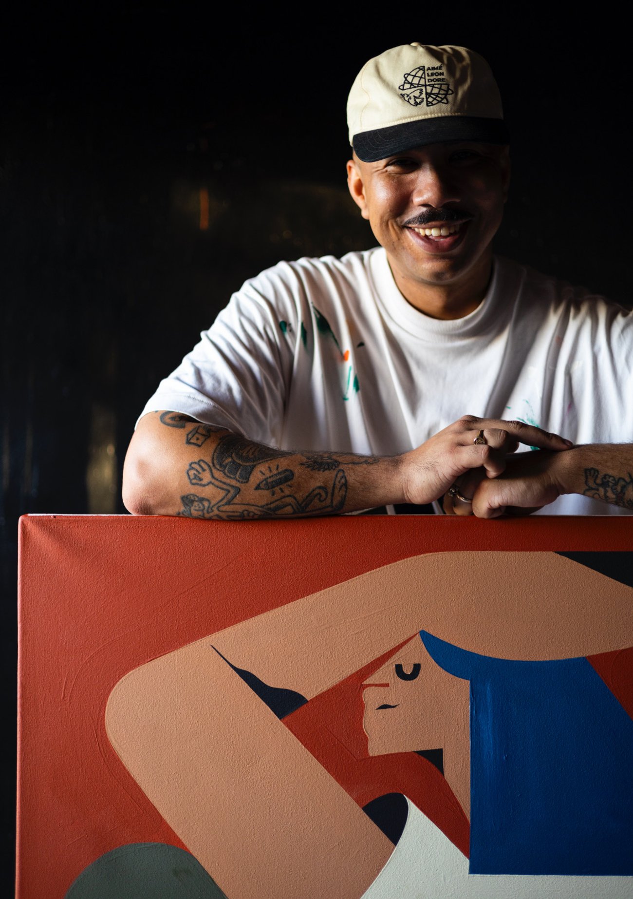 Portrait of Russell Abrahams smiling in workshop setting